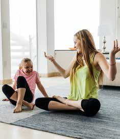 Family relaxing in a comfortable, air-conditioned living room